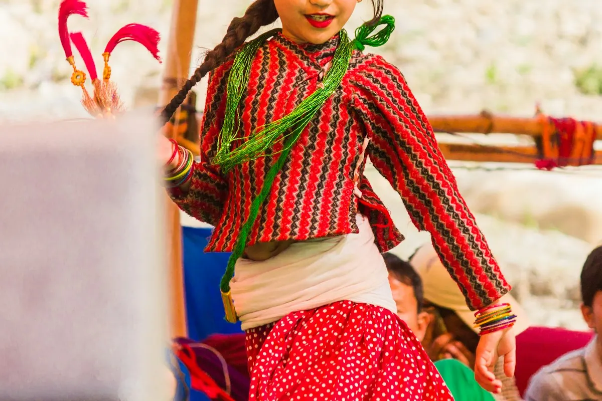 A girl dancing at a kishori club festival